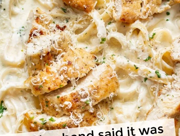Creamy chicken fettuccine Alfredo dish garnished with parsley