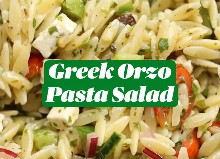 Bowl of Greek Orzo Pasta Salad with fresh vegetables and feta cheese