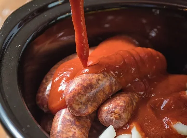 Slow Cooker Sausage with Peppers and Onions dish served warm