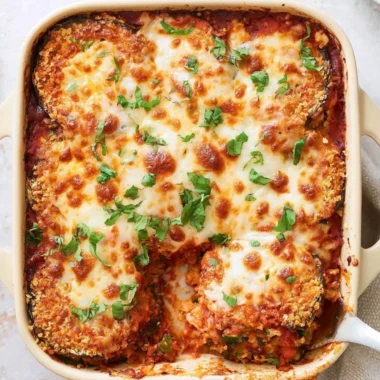 Deliciously baked eggplant parmesan with melted cheese and rich tomato sauce
