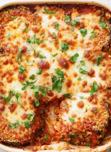 Deliciously baked eggplant parmesan with melted cheese and rich tomato sauce