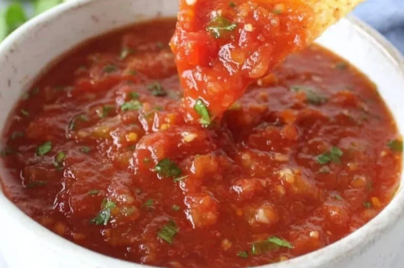 Delicious bowl of homemade salsa with fresh ingredients and vibrant colors