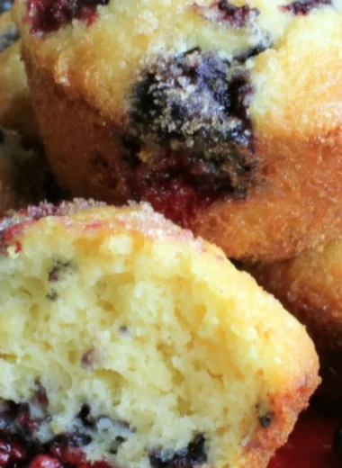 Freshly baked blackberry muffins with berries on top