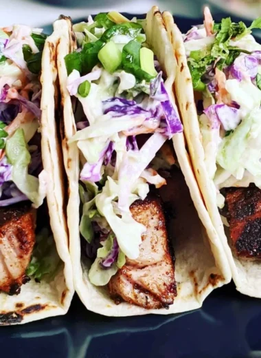 Delicious blackened seared tuna tacos served with fresh toppings
