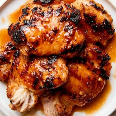 Grilled Blackstone chicken thighs seasoned and ready to serve