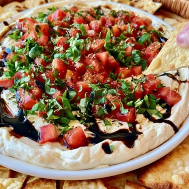 Delicious bruschetta dip served with crispy bread slices.