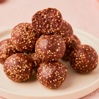 Chocolate Peanut Butter Quinoa Crunch Bites on a white plate