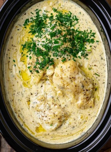 Crock Pot Angel Chicken served with vegetables on a plate