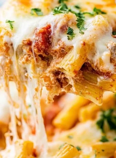 Delicious easy baked ziti with cheesy layers and savory sauce