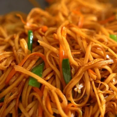Delicious homemade chow mein dish with colorful vegetables and noodles