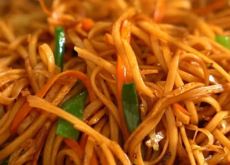 Delicious homemade chow mein dish with colorful vegetables and noodles