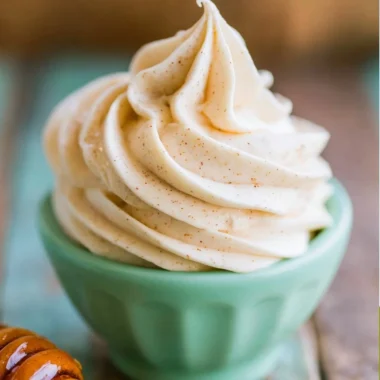 Delicious jar of easy honey butter spread on bread