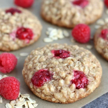 Healthy raspberry oatmeal cookies stacked on a plate