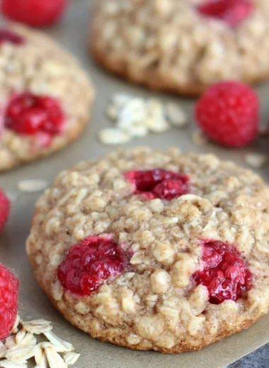 Healthy raspberry oatmeal cookies stacked on a plate