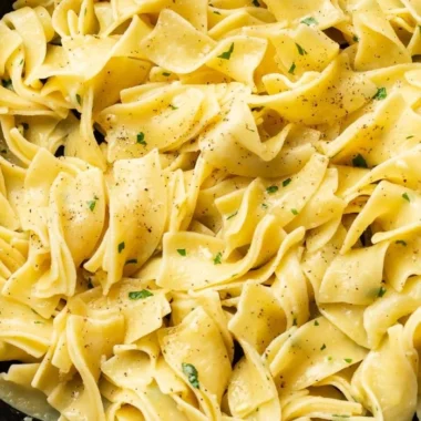 Delicious hot buttered egg noodles served in a bowl