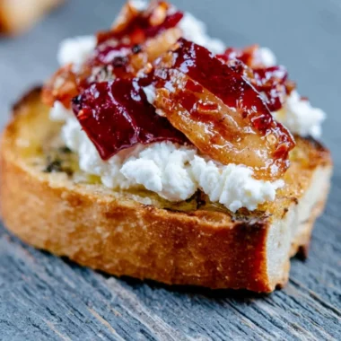 Million Dollar Bacon Goat Cheese Appetizer Log with herbs and spices