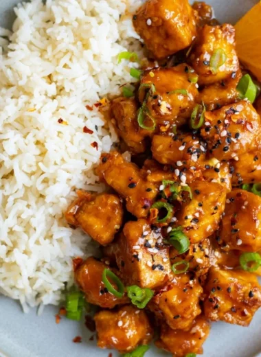 Delicious Orange Tofu dish with vibrant colors and fresh ingredients.