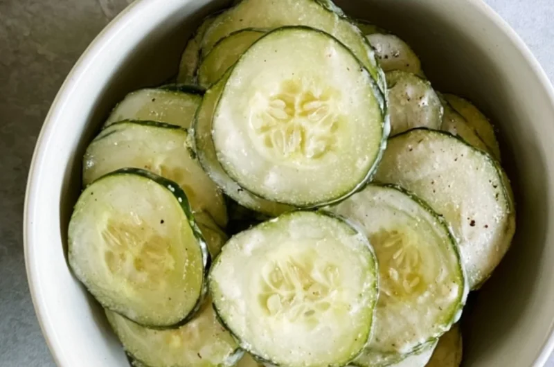 Delicious ranch cucumber chips served in a bowl, perfect for snacking.