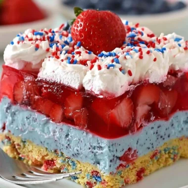 Delicious Summer Berry Dessert Lasagna with layers of cream and fresh berries