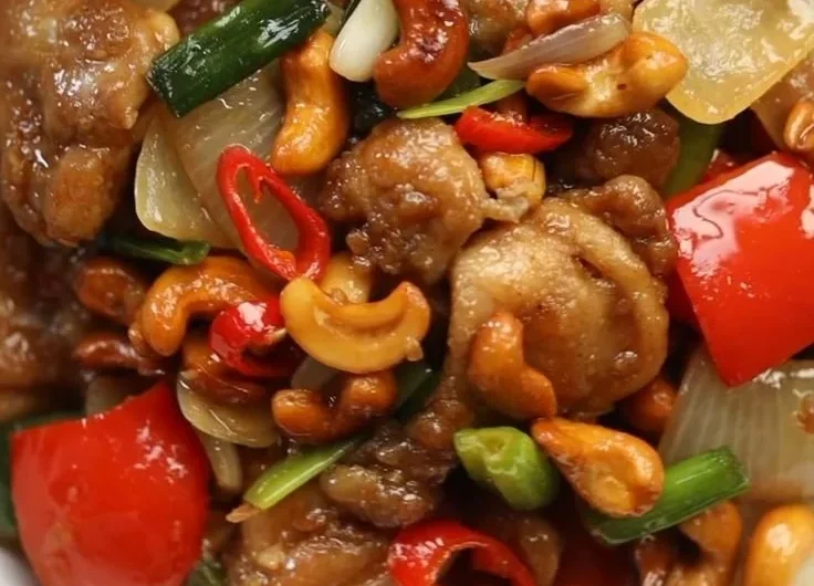 Delicious Thai Cashew Chicken with cashews and spices on a plate