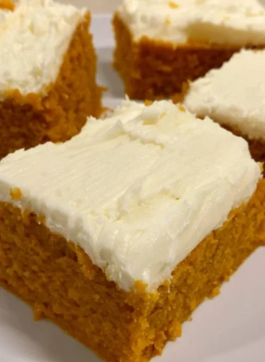 Delicious cozy pumpkin cream cheese bars with a creamy frosting on top