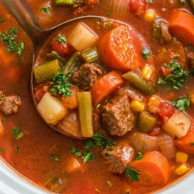 Bowl of delicious crockpot vegetable beef soup served hot
