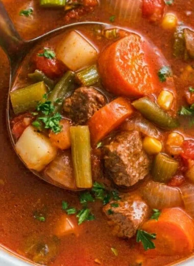 Bowl of delicious crockpot vegetable beef soup served hot