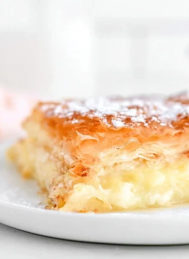 Fresh Greek Bougatsa pastry filled with creamy custard.