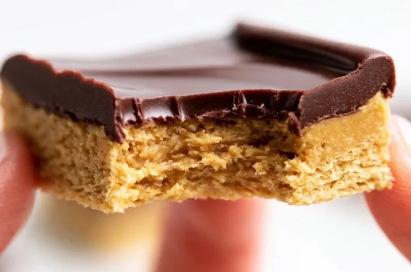 Delicious Lunch Lady Peanut Butter Bars stacked on a plate