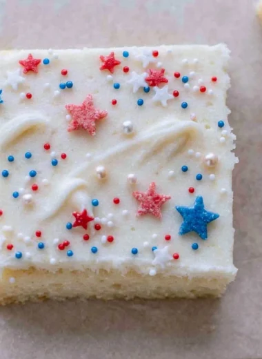 Patriotic Sugar Cookie Bars with red, white, and blue icing for festive occasions